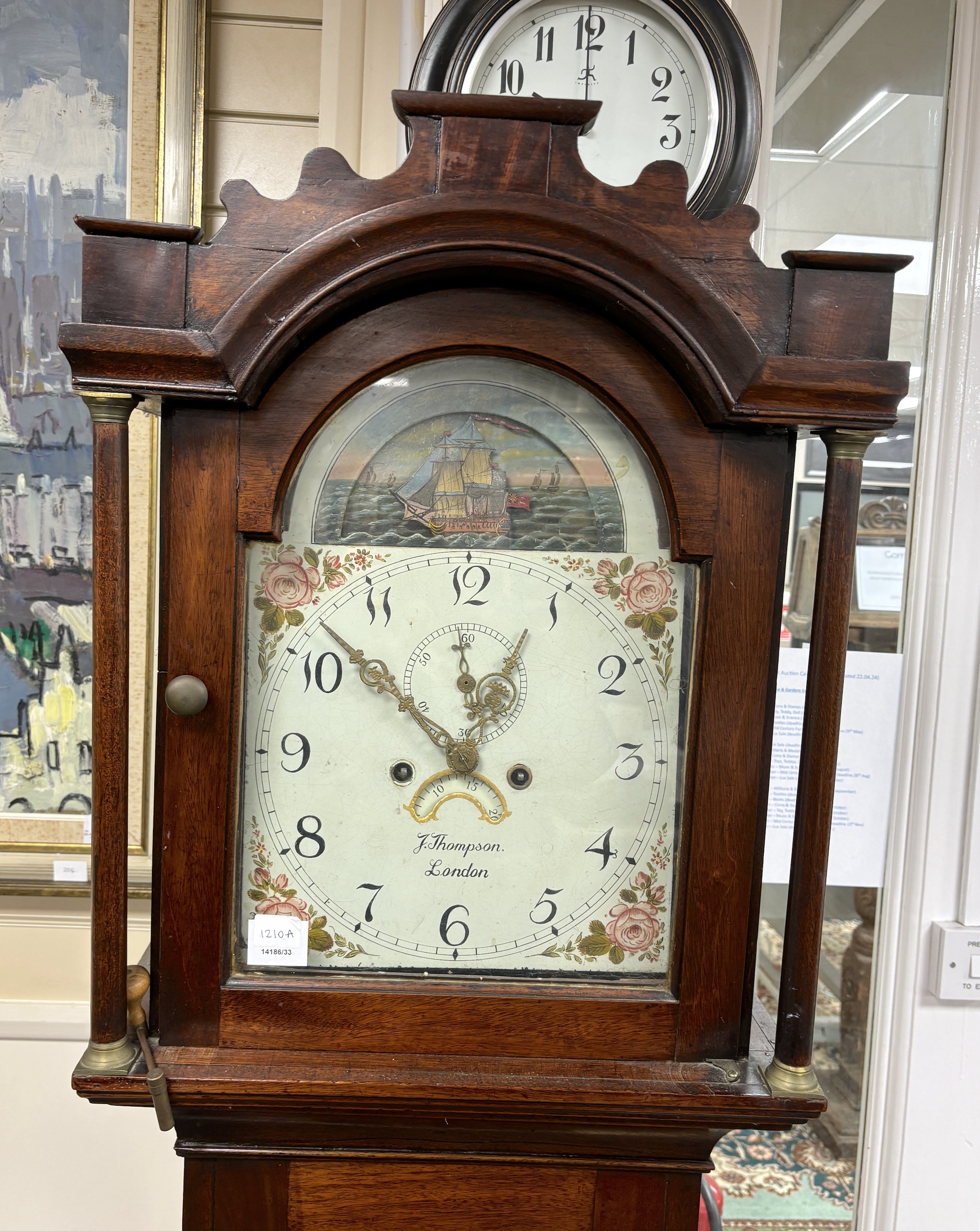 An early 19th century mahogany eight day longcase clock, marked Thompson of London, height 214cm